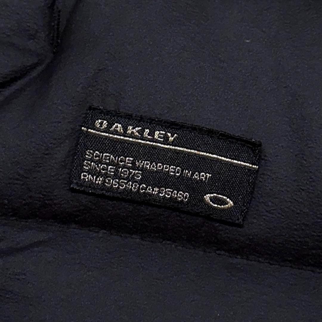 【オークリー】フェザー ブレンド スカル ロゴ ダウンベスト ゴルフ M 黒×金 オークリー】フェザー ブレンド スカル ロゴ ダウンベスト ゴルフ M 黒