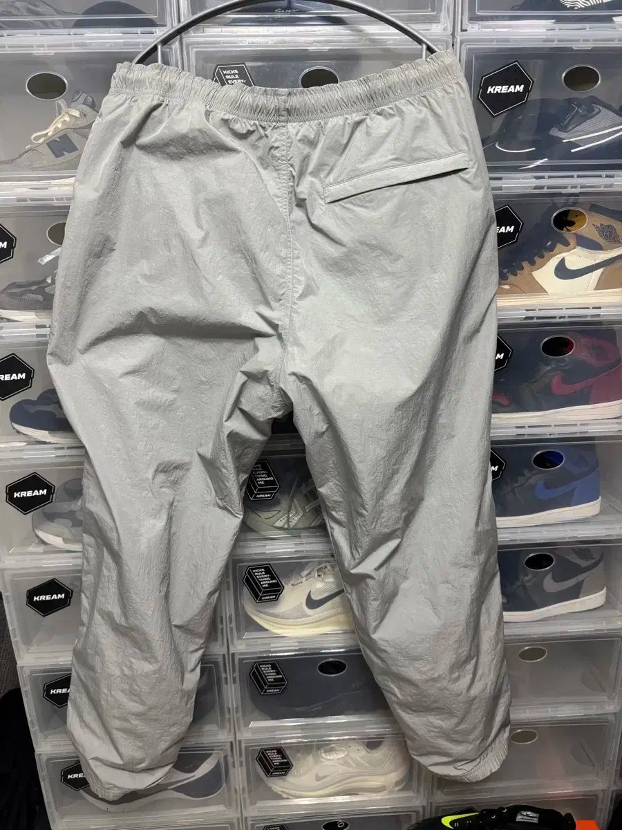 一覧爆安！ 海外 L NIKE M NRG トラックパンツ ライトスモーク グレー