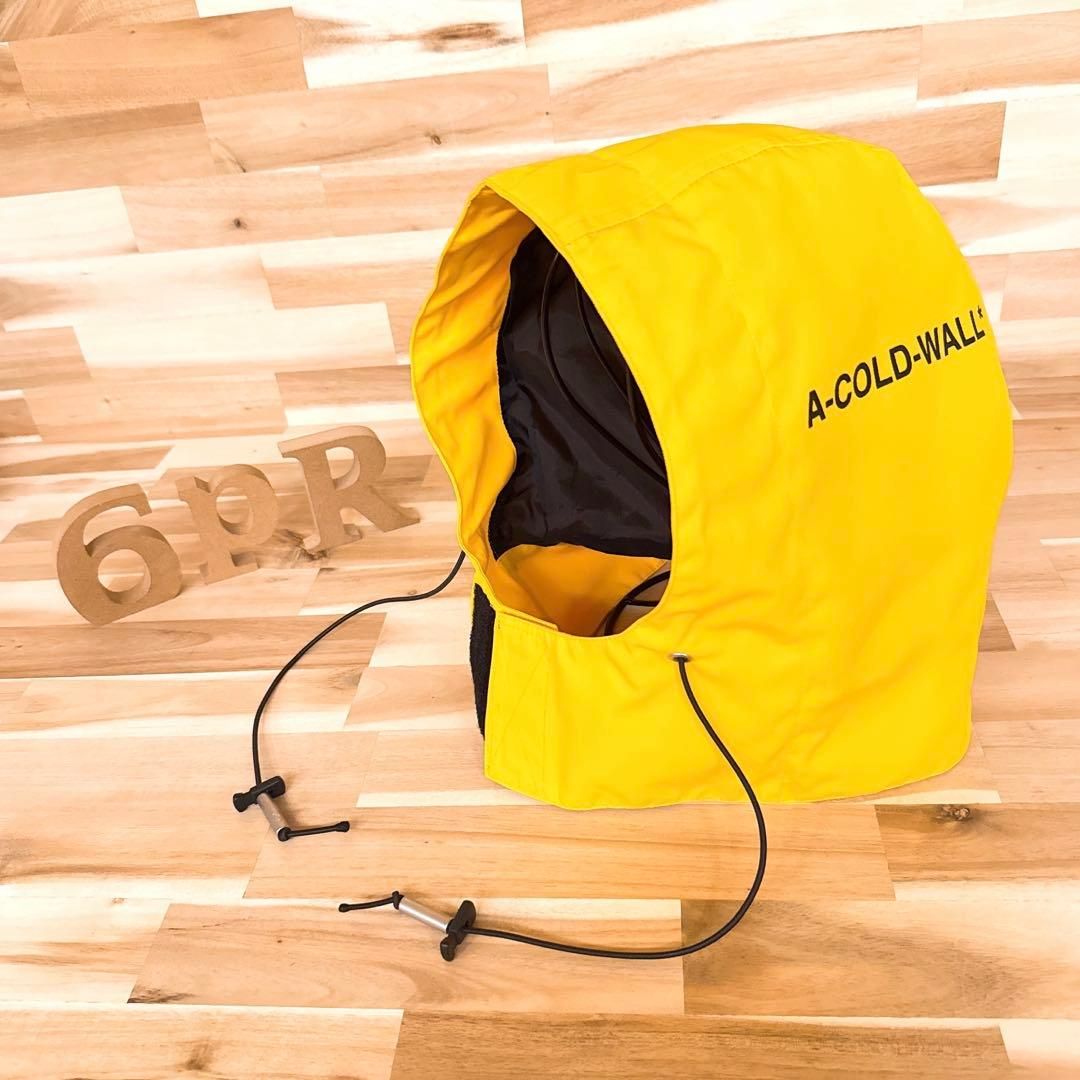 アコールドウォール サイド ロゴ ナイロン フード イエロー×黒ブラック