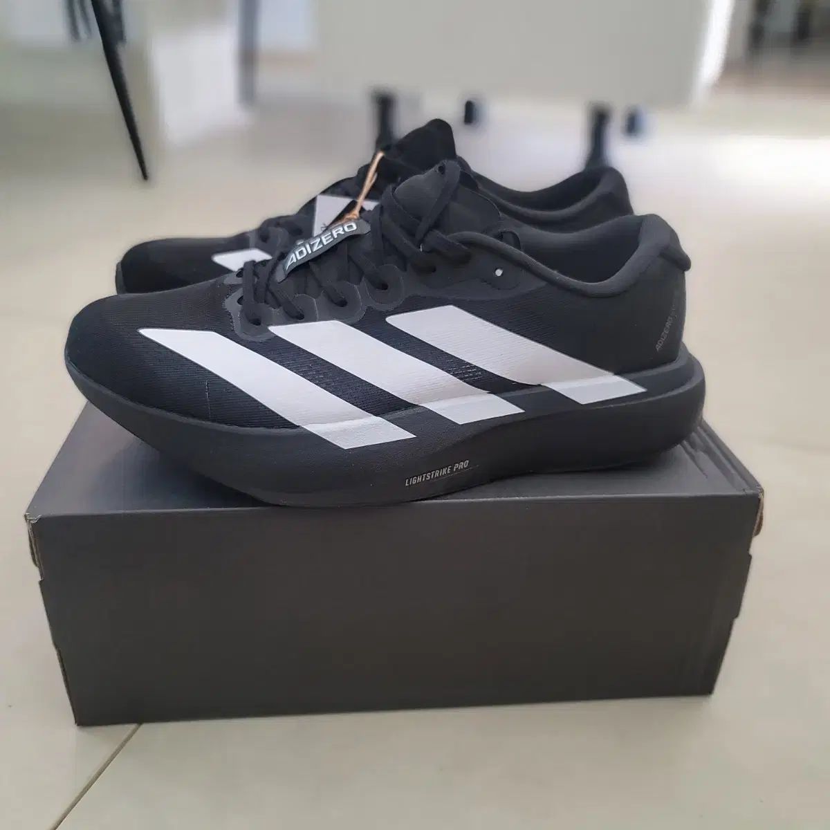 アディダス アディゼロ EVO SL ブラック 275mm