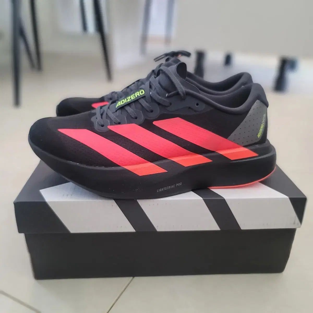 アディダス アディゼロ EVO SL ブラック レッド 275 mm