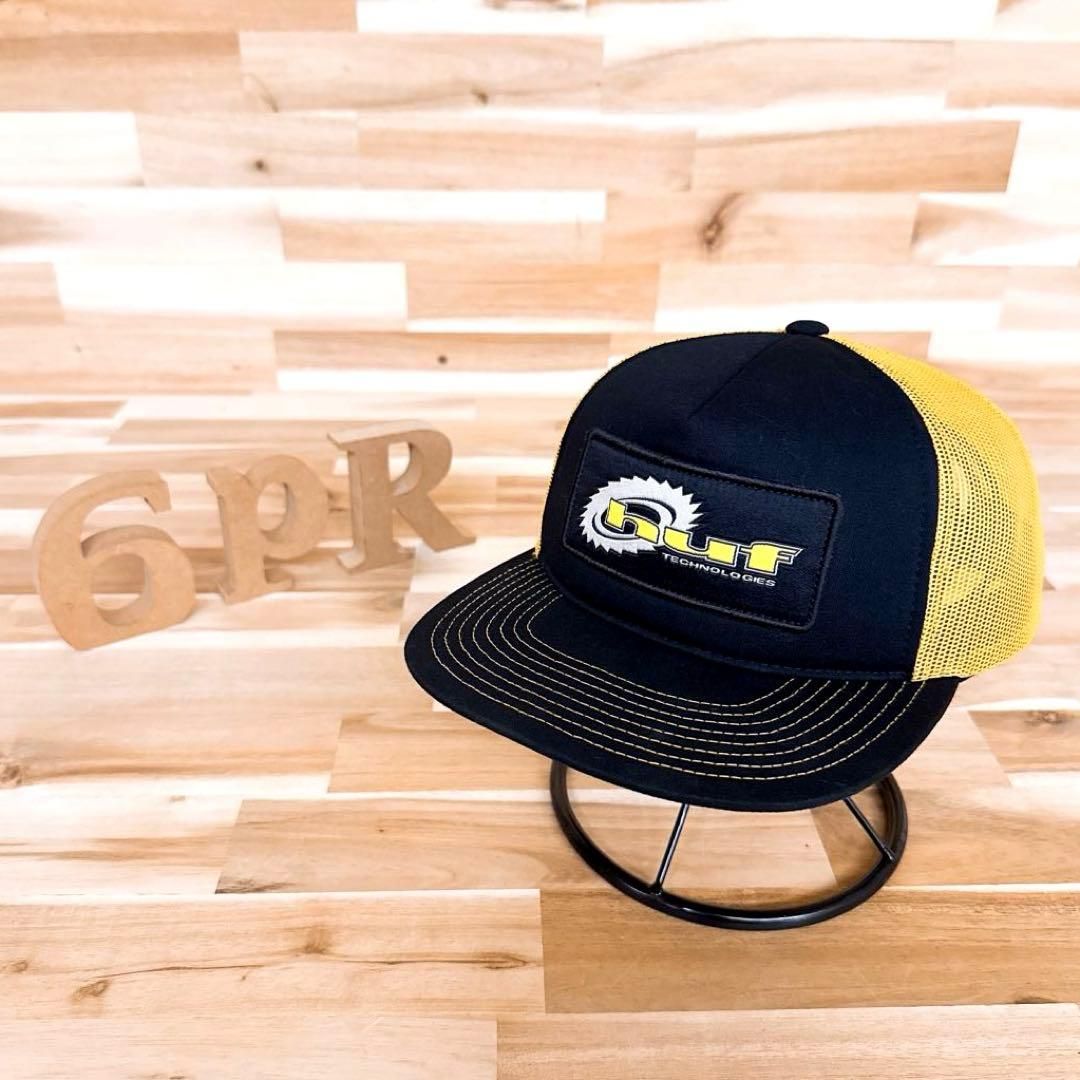 ハフ チェーンソー ロゴ トラッカー メッシュキャップ黒×黄イエロー