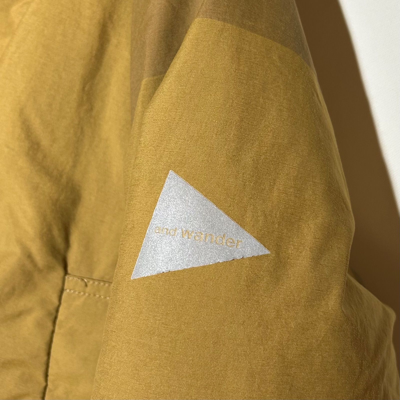 アンドワンダー and wander tough down jacket ユニセックス ダウン 