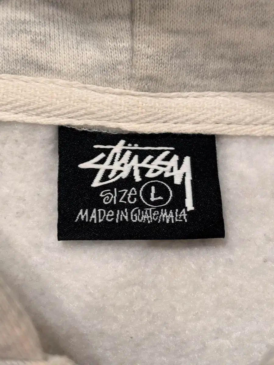 STUSSYワールドツアー ジップアップフーディー L アッシュヘザー