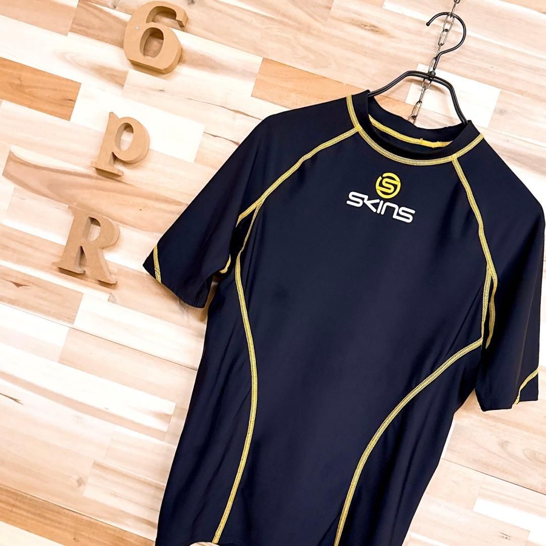 スキンズ コンプレッション インナーウェア 半袖Tシャツ スポーツ L 黒×黄