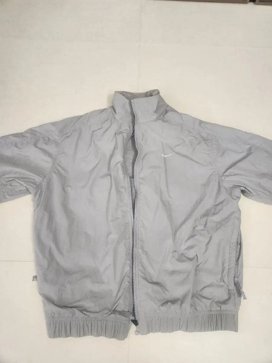 ナイキ NRG トラックジャケット グレー xs