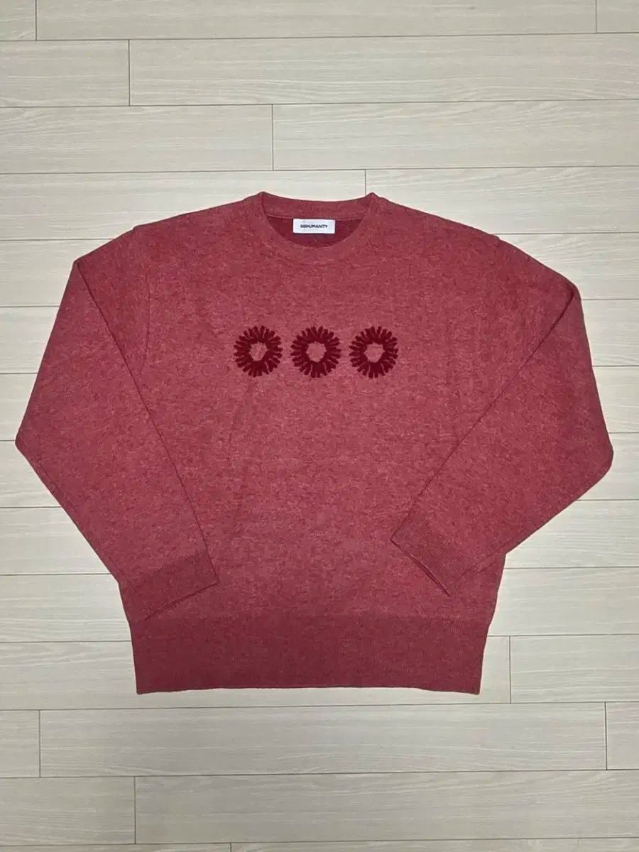 M 999ヒューマニティ ニット コーラル