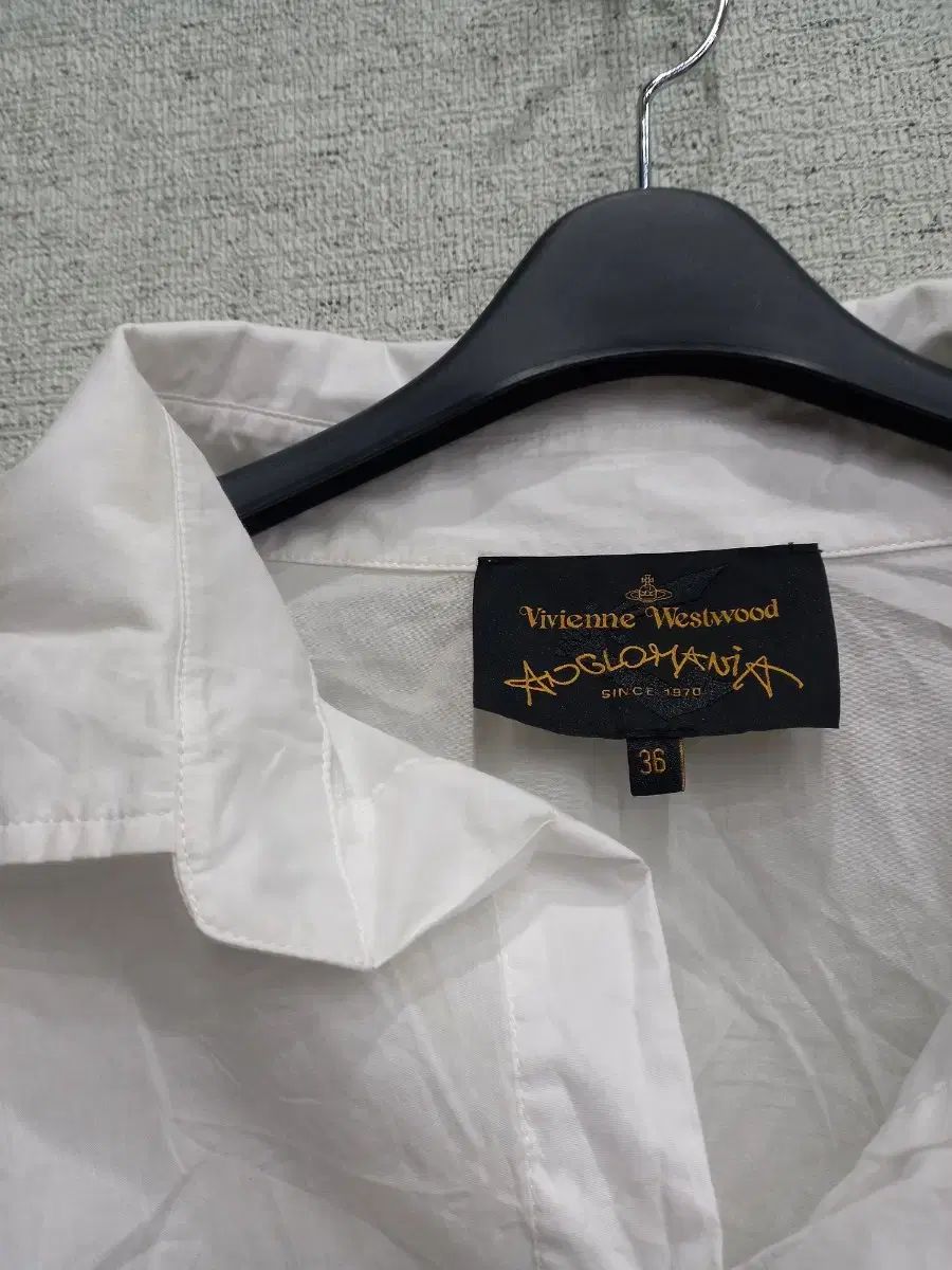 ヴィヴィアン ウエストウッド クロップド ラグラン型 シャツ Free!