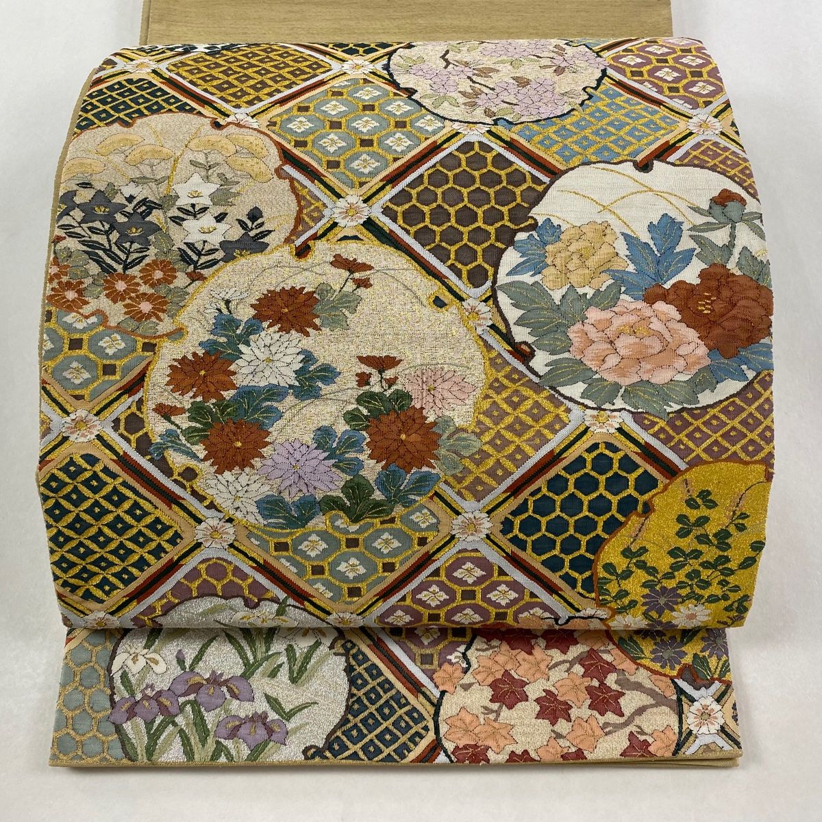 袋帯 雪輪 草花 金銀糸 薄茶色 お太鼓柄 正絹