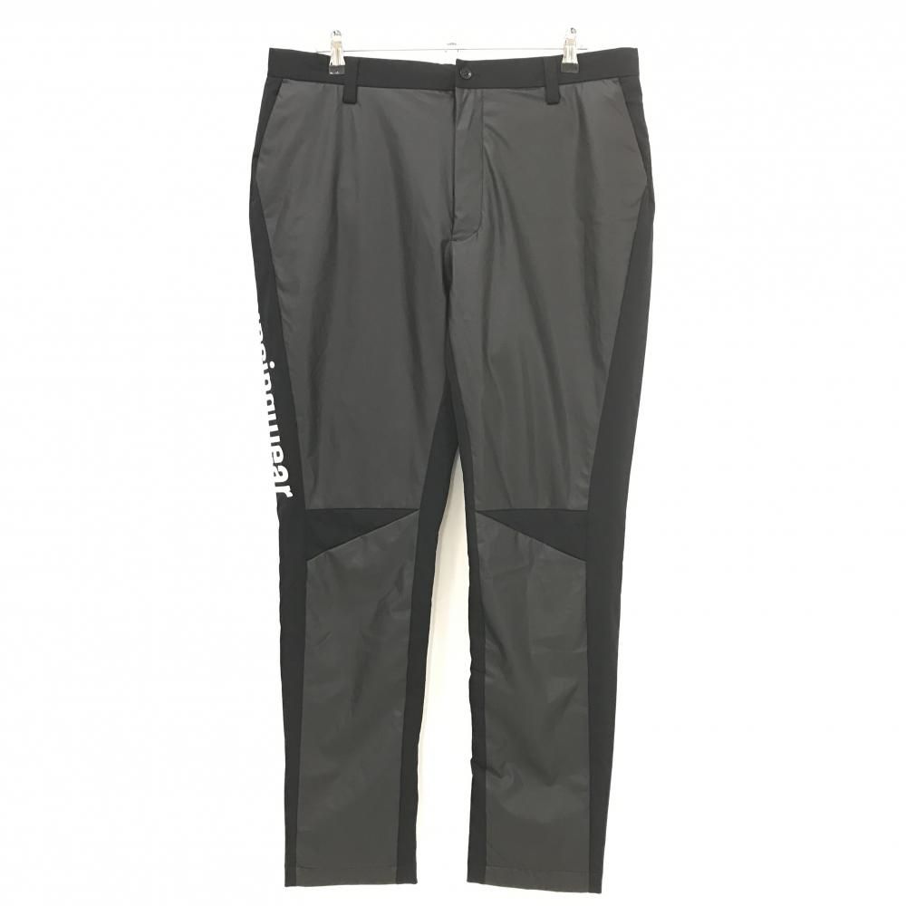 超 マンシングウェア 中綿異素材パンツ 黒×白 サイドロゴ メンズ 95-100 ゴルフウェア モデル Munsingwear