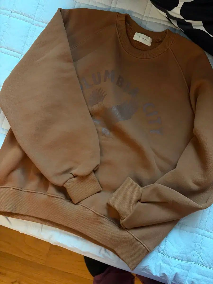 シエンヌ sienne コロンビア スウェットシャツ
