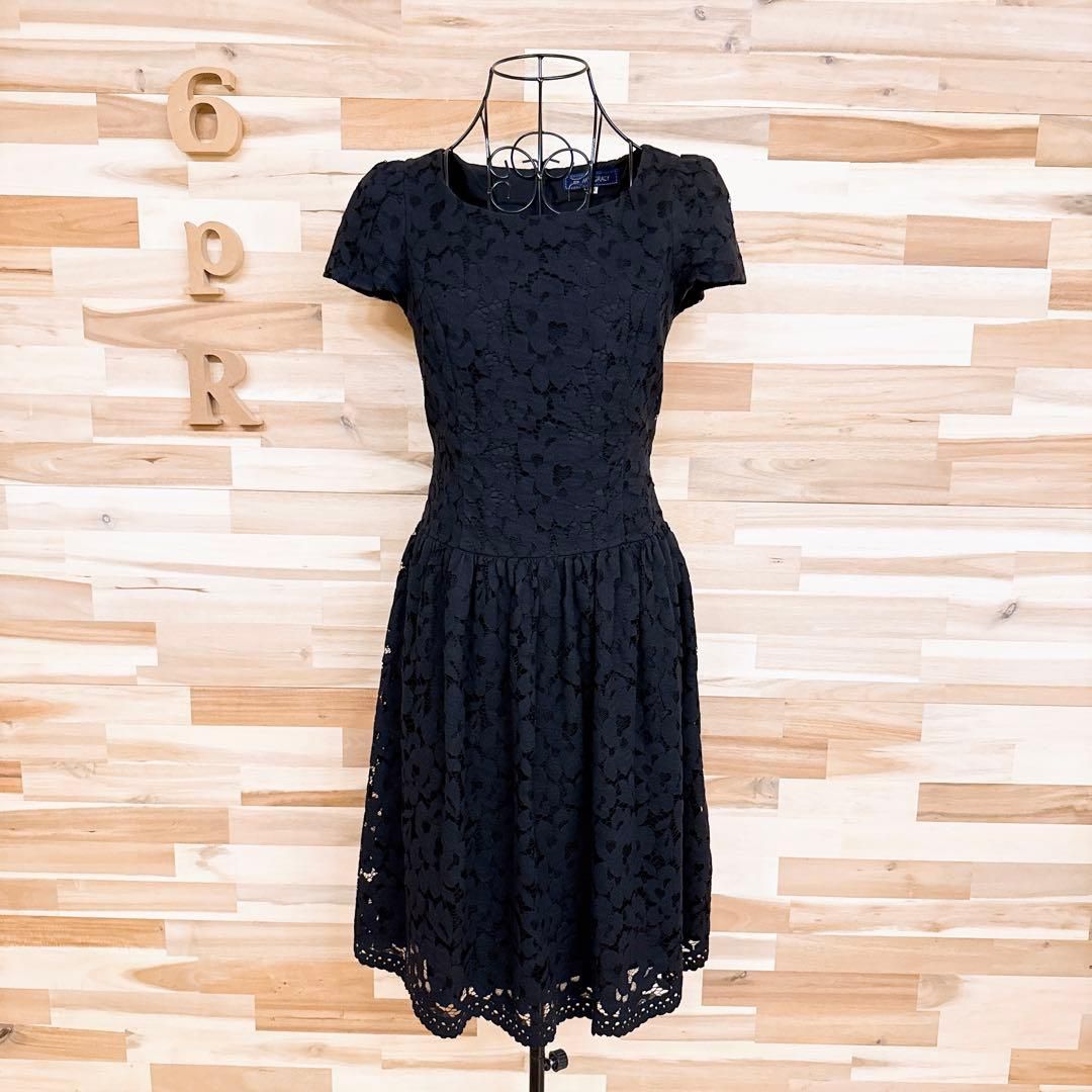 MS GRACY エムズグレイシー ワンピース ブラック 黒 サイズ:38(M) | リボン フラワープリント ドレス / ワンピース | 半袖 ミモレ丈 タック Aライン フレア ブランドロゴ コットン | 日本製 | トップス【レディース】【中古】【K4636】 MS GRACY エムズグレイシー ワンピース ブラック 黒 サイズ:38(M