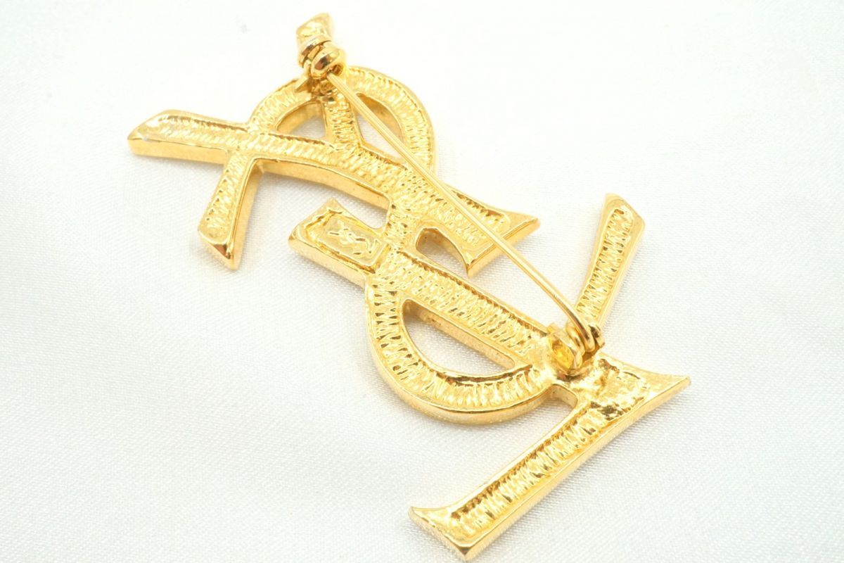 YSL イヴ・サンローラン ヴィンテージ ブローチ サンローラン ゴールド　ロゴ ヴィンテージ YSL イヴ・サンローラン ロゴ ブローチピン - ゴールド