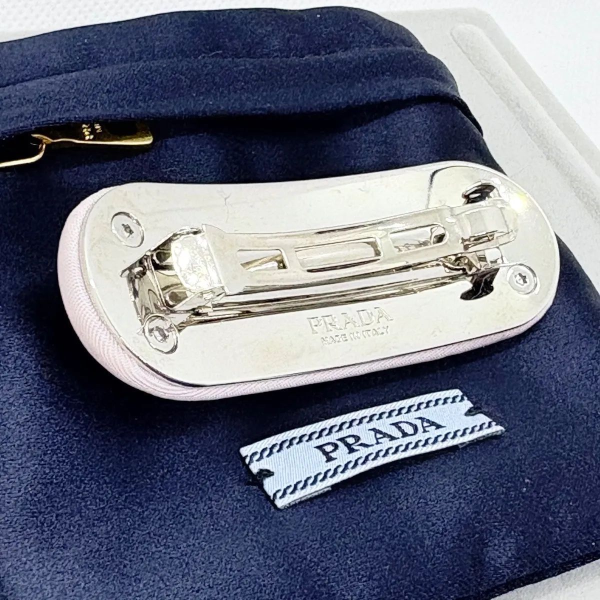 三角ロゴプレート