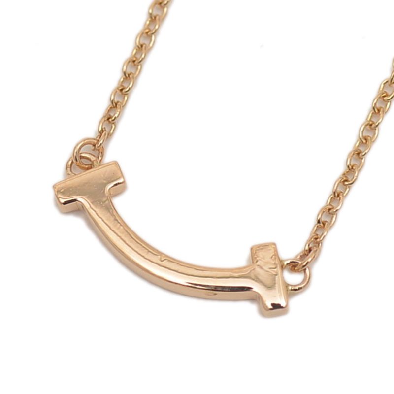 ティファニー Tスマイル ペンダント ネックレス ミニ K18PG - メルカリ