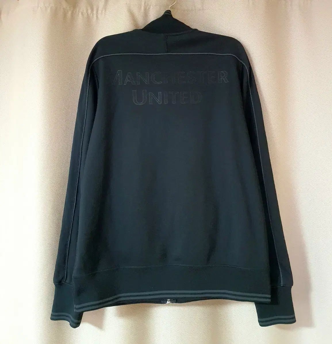 新品) NIKE マンチェスター・ユナイテッドFC DHL トラックジャージ