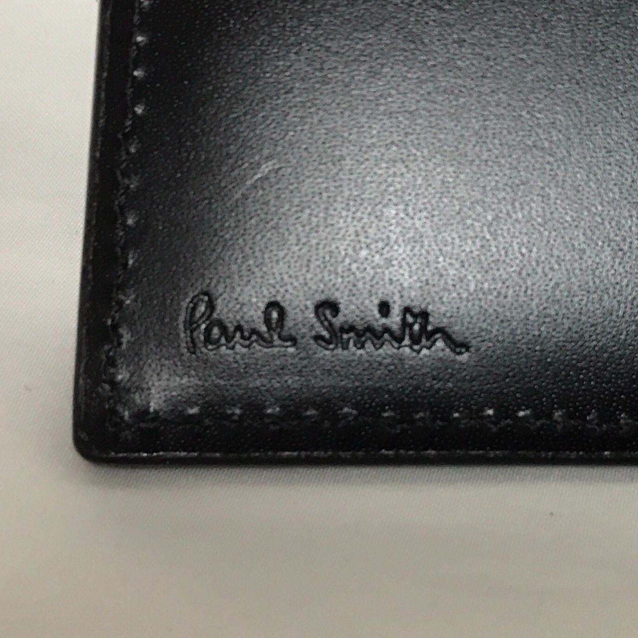 PaulSmith シティエンボス 二つ折り財布 小売 ブルー Paul smith