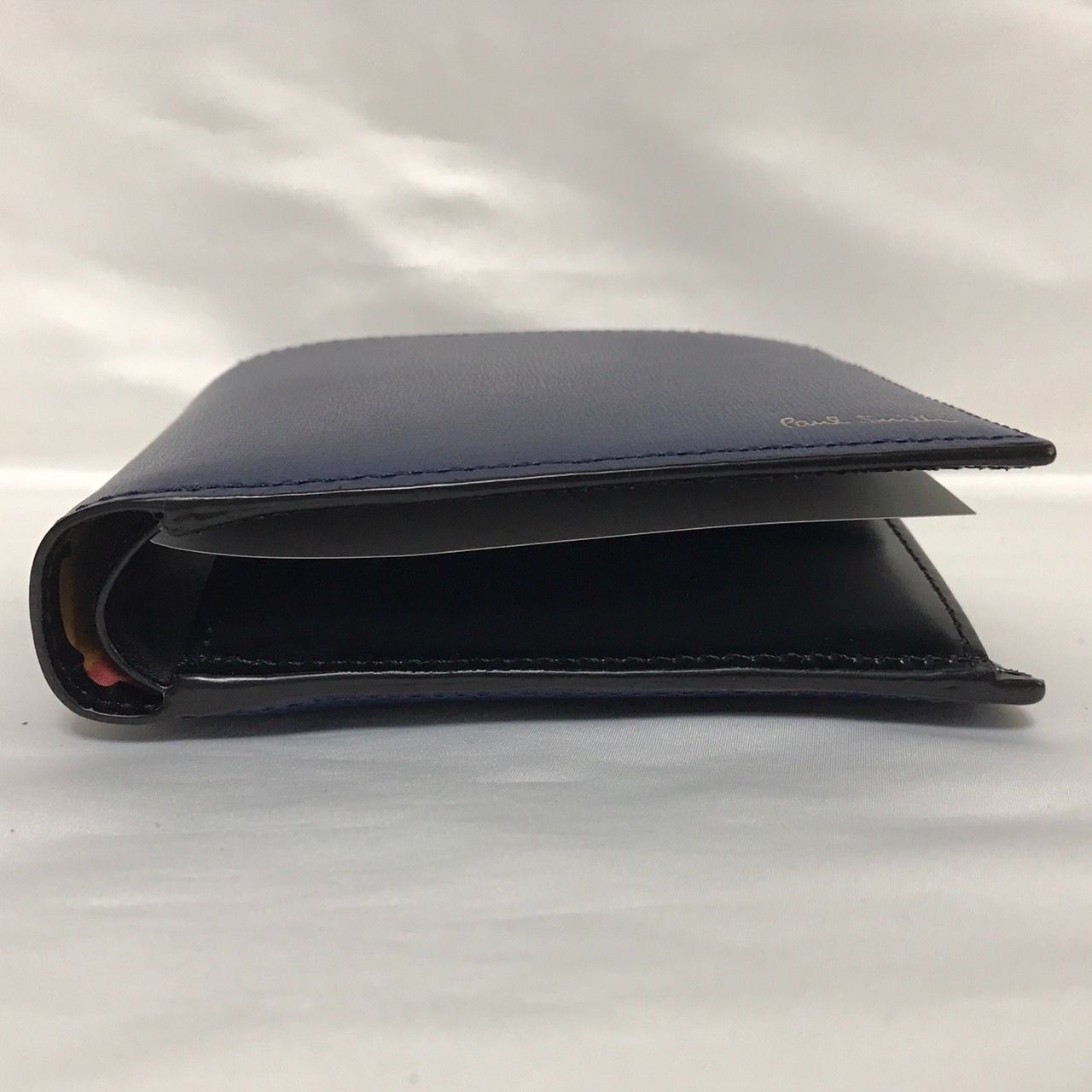 PaulSmith シティエンボス 二つ折り財布 小売 ブルー Paul smith