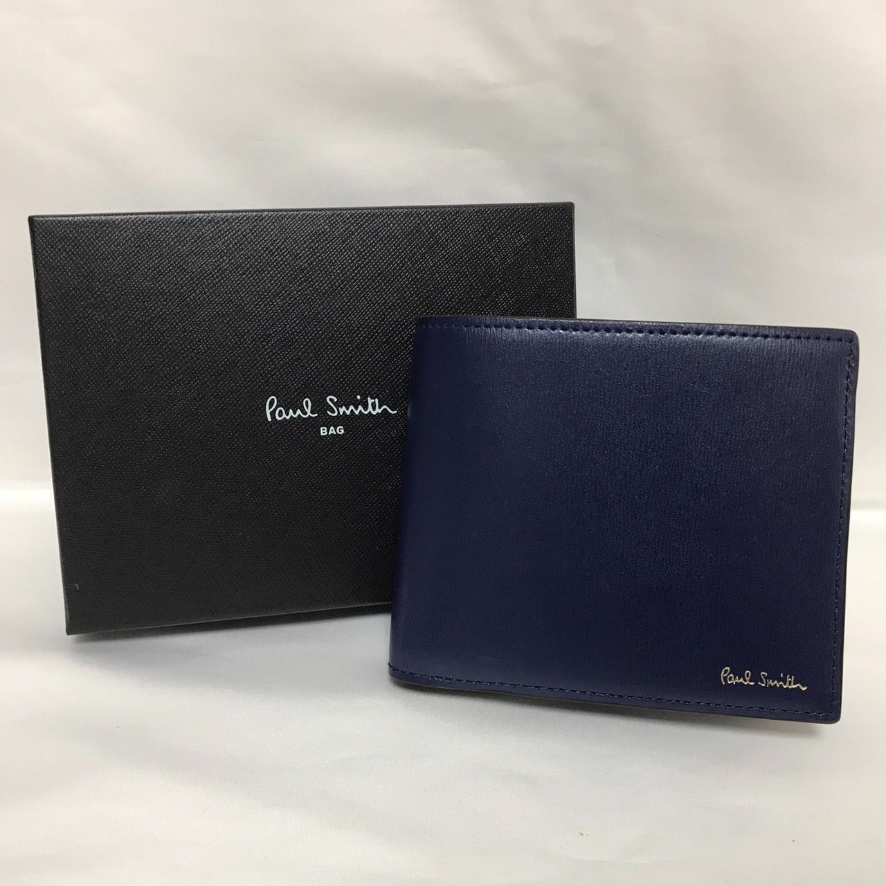 PaulSmith シティエンボス 二つ折り財布 ブルー - メルカリ