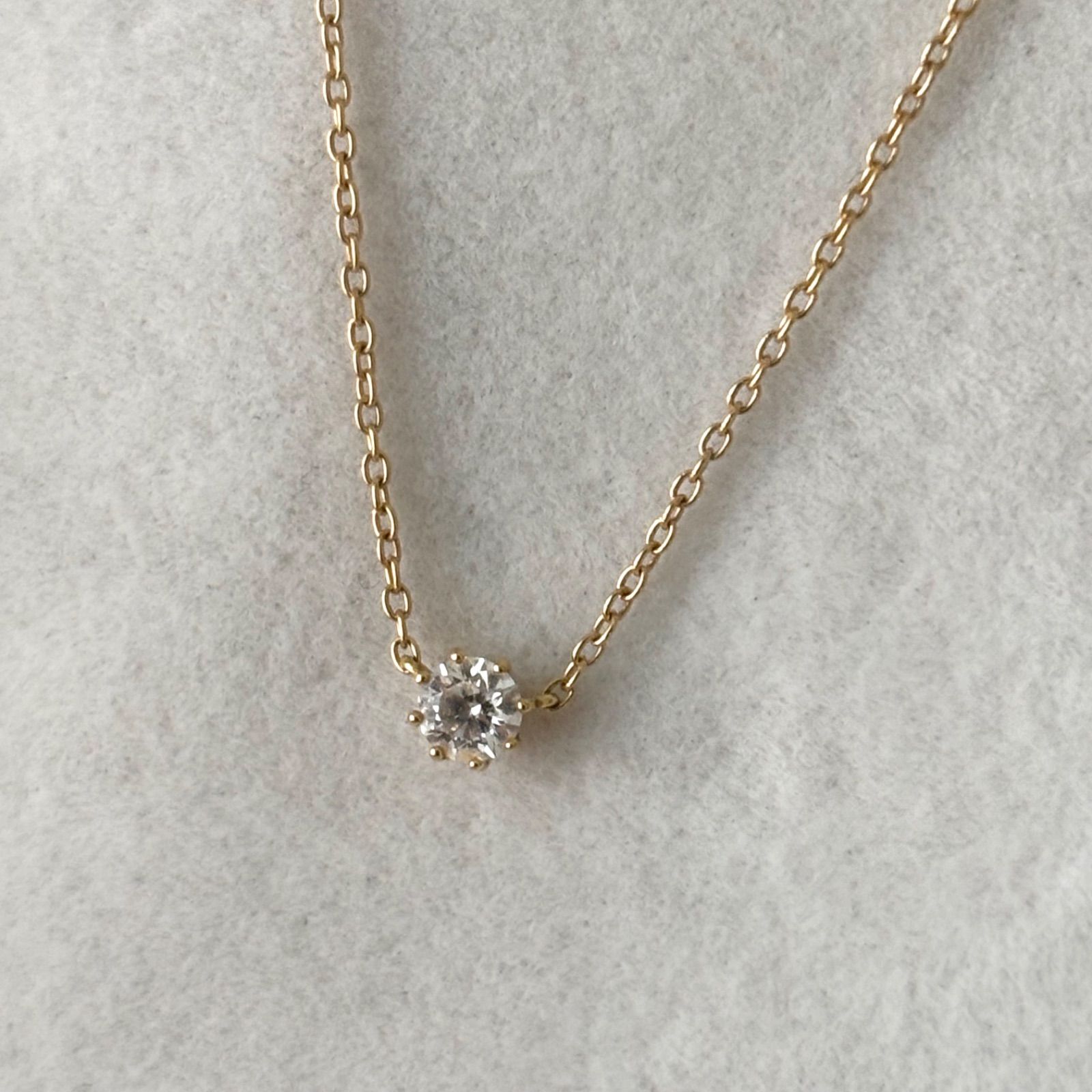 013【アーカー】K18 一粒 ダイヤモンド 0.15ct ソルティアラウンド