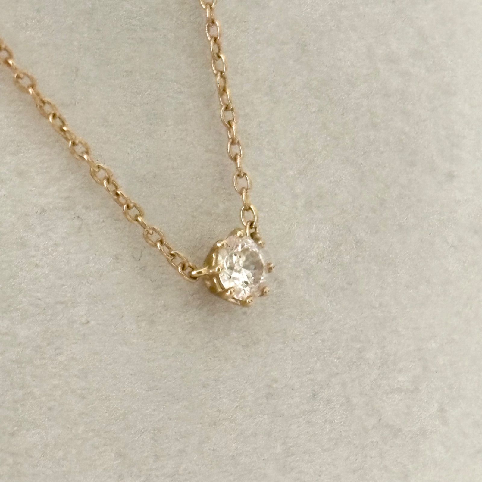 013【アーカー】K18 一粒 ダイヤモンド 0.15ct ソルティアラウンド
