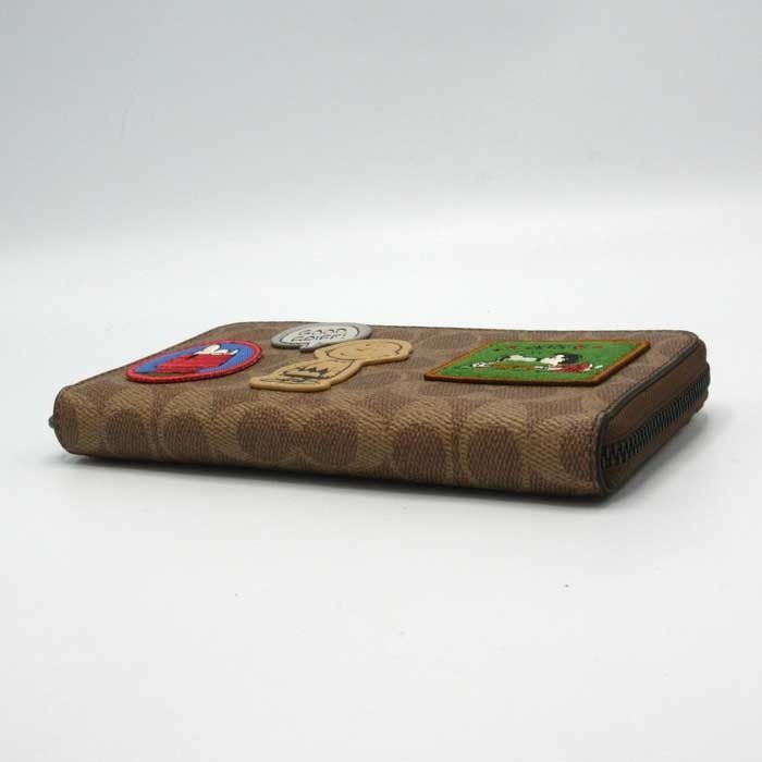 新品　COACH x PEANUTS スヌーピー 二つ折り財布　シグネチャー 新品】コーチ 財布 長財布 COACH X PEANUTS ピーナッツ スヌーピー