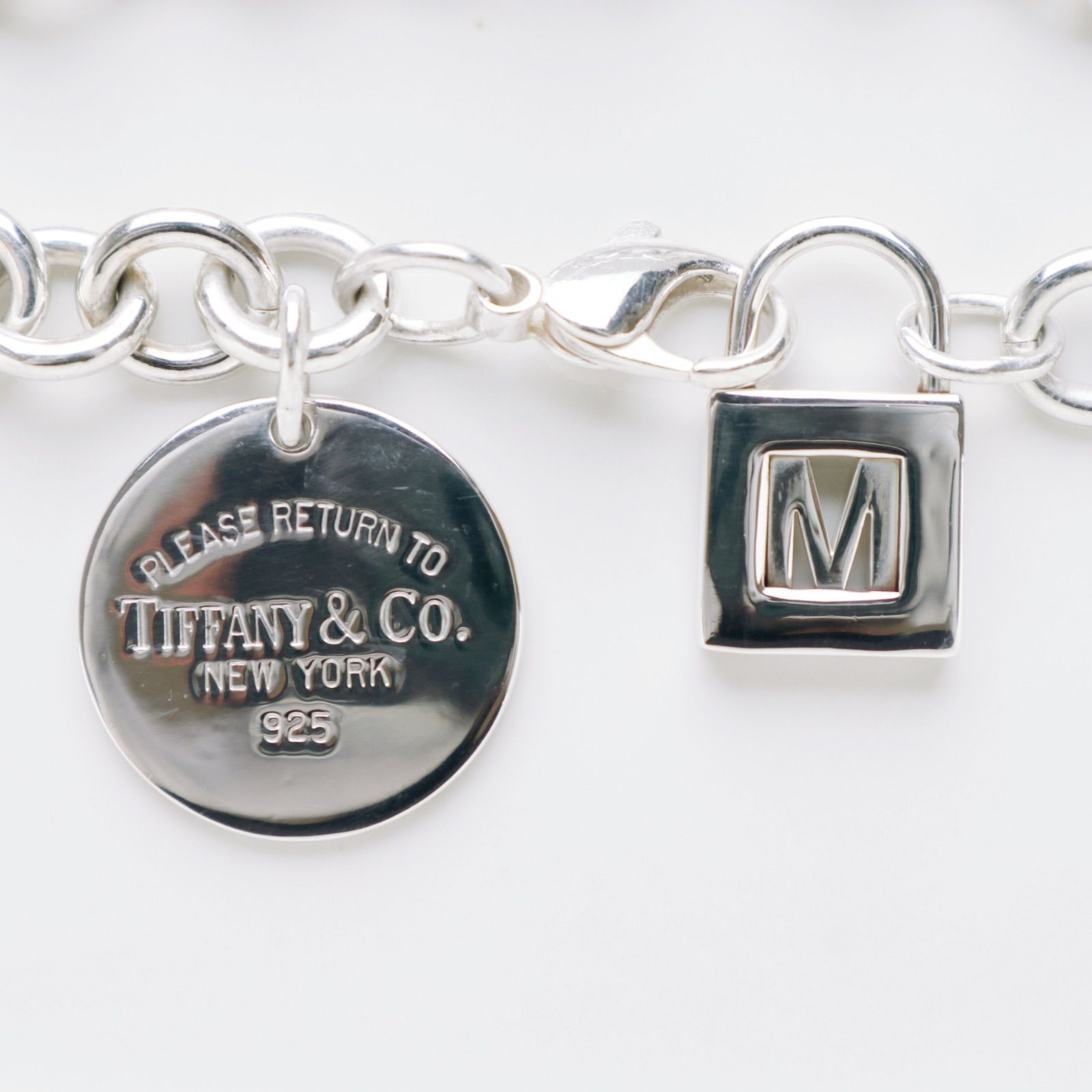 ティファニー ラウンドタグ リターントゥ イニシャルM カデナ  