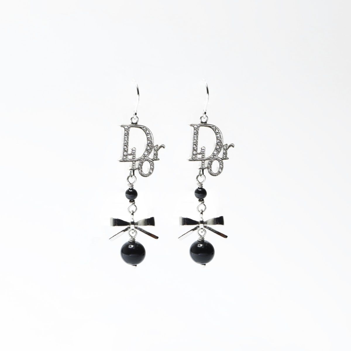 Christian Dior クリスチャンディオール ピアス ロゴ リボン - メルカリ