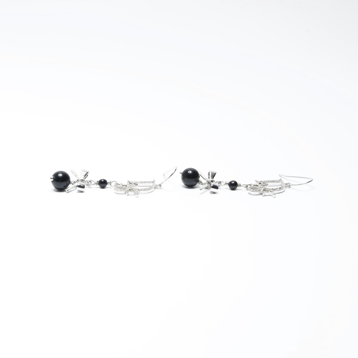 Christian Dior クリスチャンディオール ピアス ロゴ リボン - メルカリ