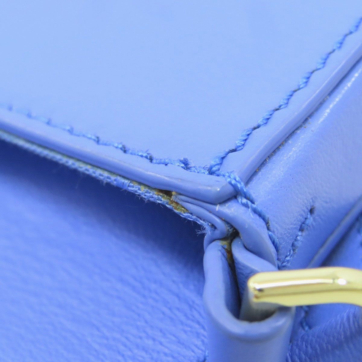 Tory Burch トリーバーチ スマホショルダー フェイスモチーフ