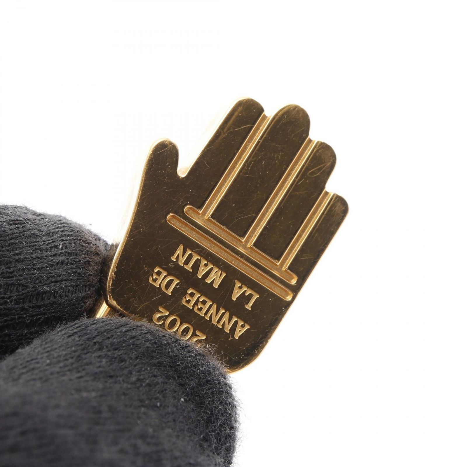 Hermès 2002 Annee De La Main Gold-Tone Hand Motif Cadena Lock