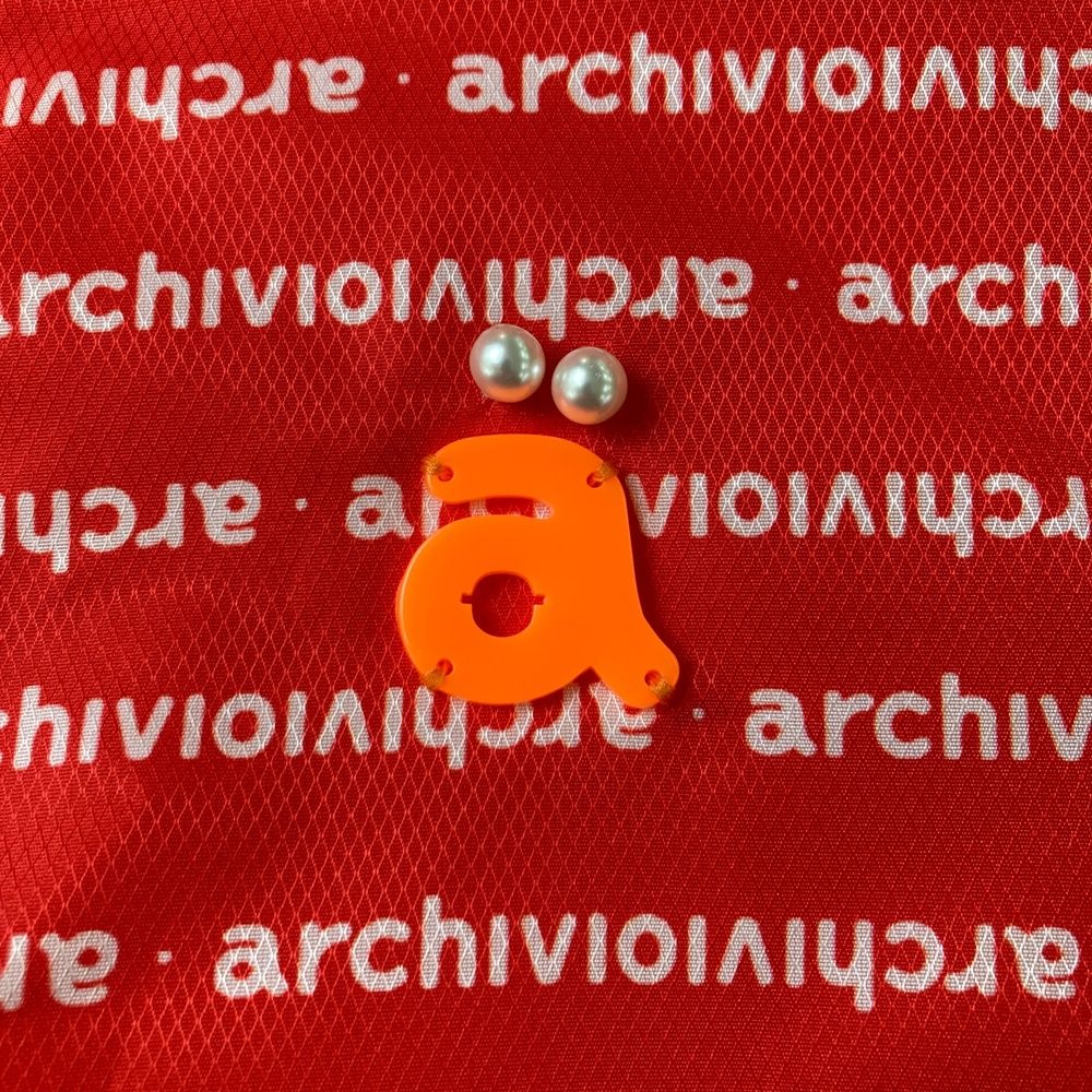 サイズ：40 ARCHIVIO アルチビオ ; ジップベスト ロゴ総柄 レッド系