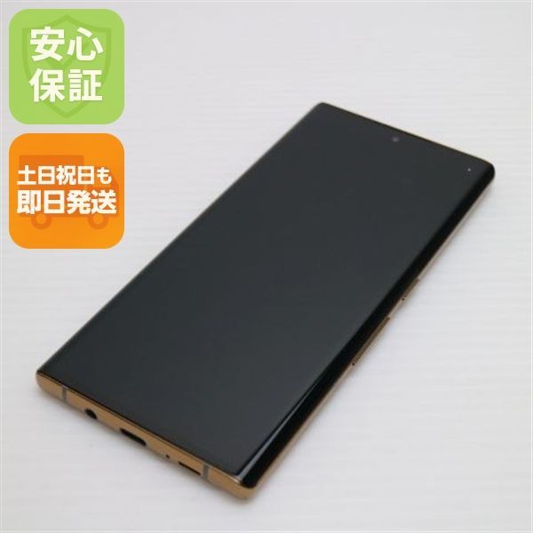 美品 F-52A arrows NX9 ゴールド 即日発送 スマホ 白ロム 富士通 土日