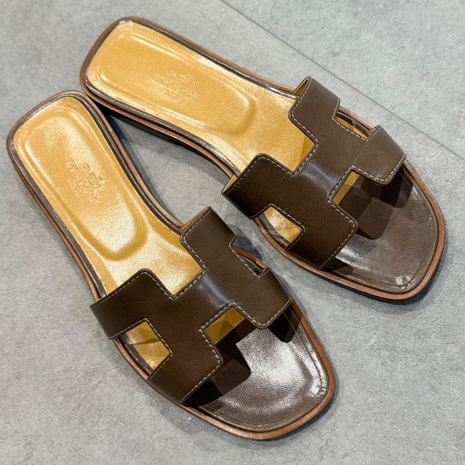 美品 HERMES エルメス サンダル オラン Hロゴ フラットシューズ