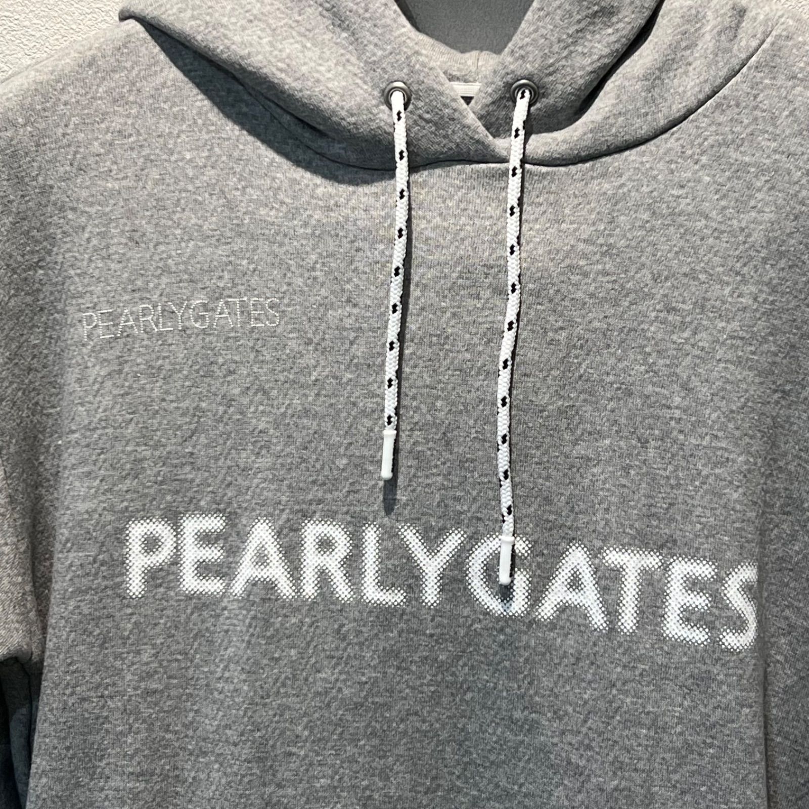 新品タグ付】PEARLY GATES ジグザグ裏毛ジャガードスウェットフーディ