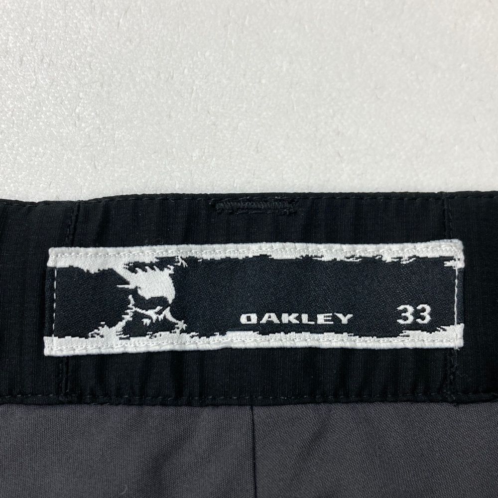 サイズ：33 OAKLEY オークリー 中綿 ロングパンツ スカル刺繍 ブラック