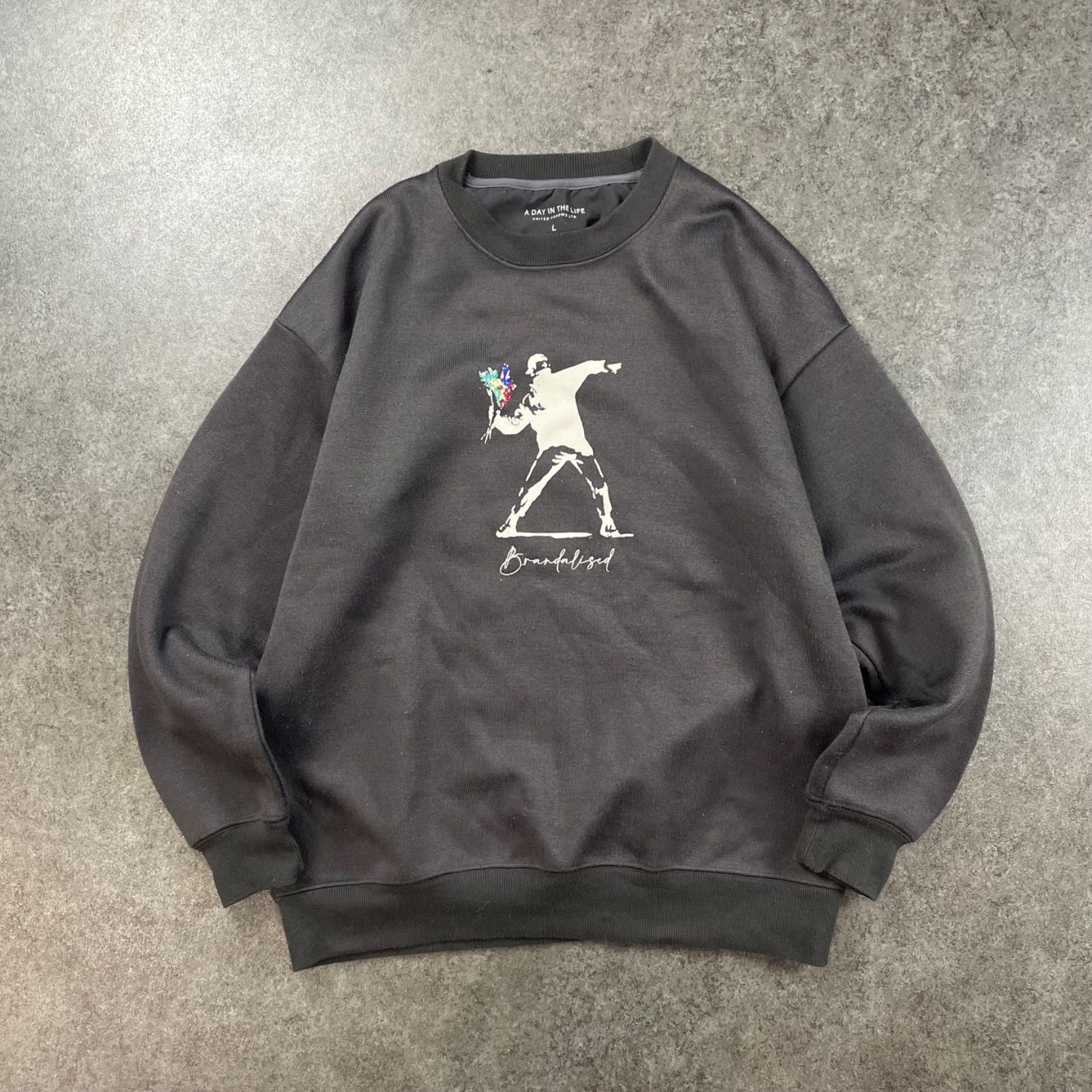 BRANDALISED A DAY IN THE LIFE UNITED ARROWS BANKSY FlowerBomber 