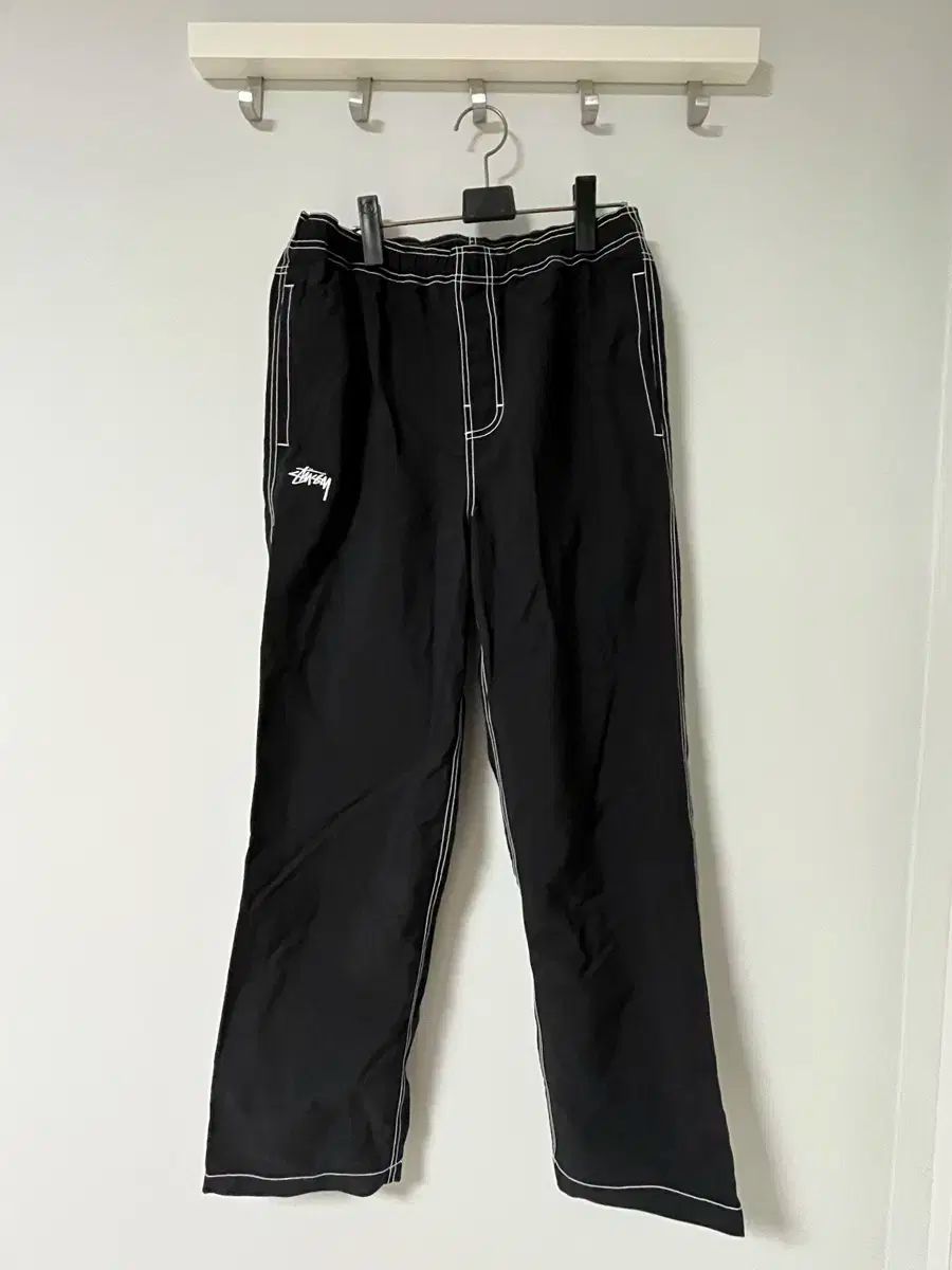 stussy ナイロンパンツ 国内発送 関税込 Nike x Stussy 2WAYナイロンパンツ (STUSSY/パンツ