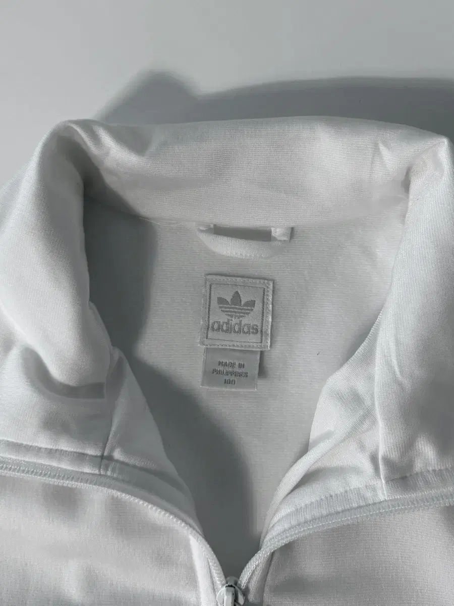 アディダス 90s ルーズフィット サイドライン 白 トラック ジャージ