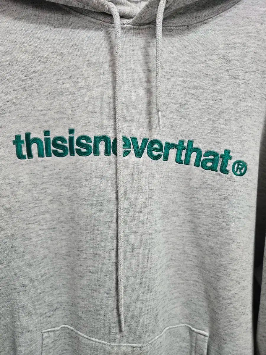 ディスイズネバーザット グレー フーディー M - メルカリ