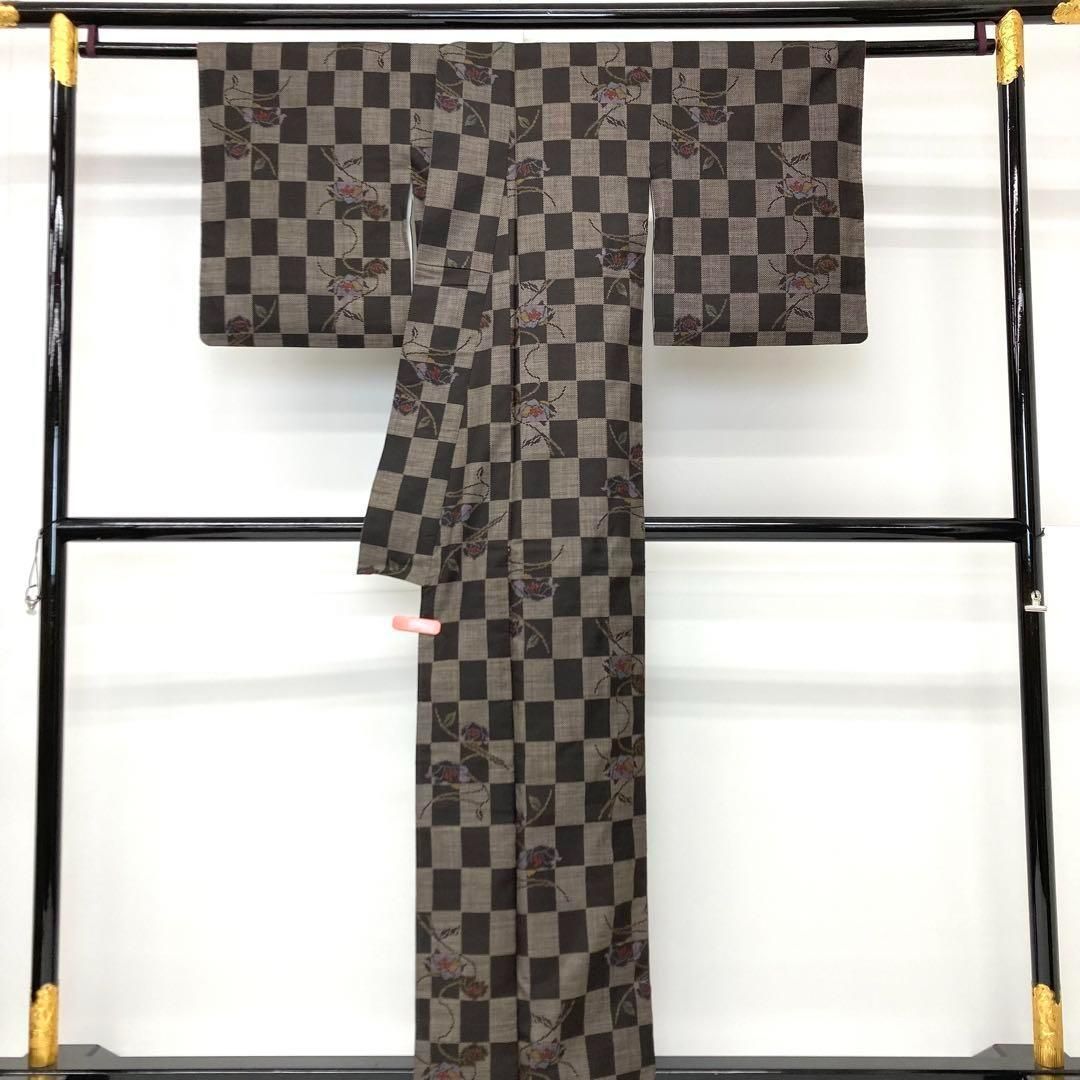 着物と帯 時流】オ24801s◇本場泥大島紬◇縦横絣 美品 裄64丈160