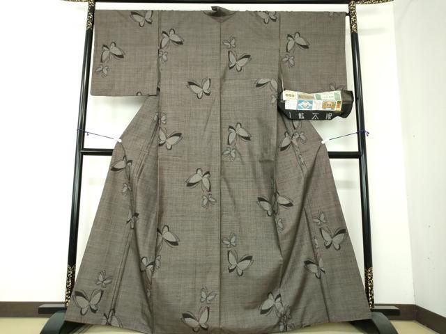 平和屋着物▽本場大島紬 反物 着尺 7マルキ 幾何学文様 逸品 未使用