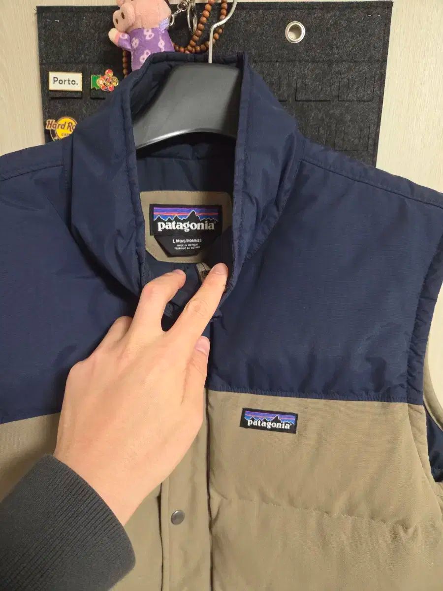 パタゴニア ダウン ベスト ベージュ/ネイビー 100 - メルカリ