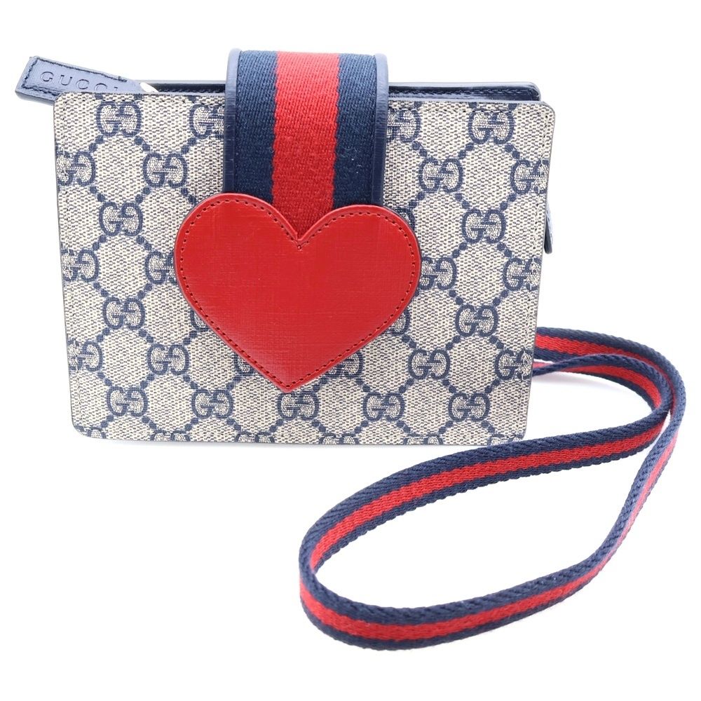 美品】Fendi ロゴプリント ハンドバッグ 赤バッグチャーム付き ズッカ