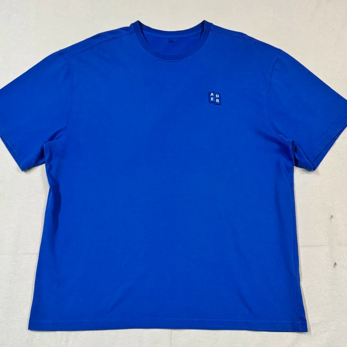 L) ADER ERROR ブルー TAG 半袖 Tシャツ - メルカリ