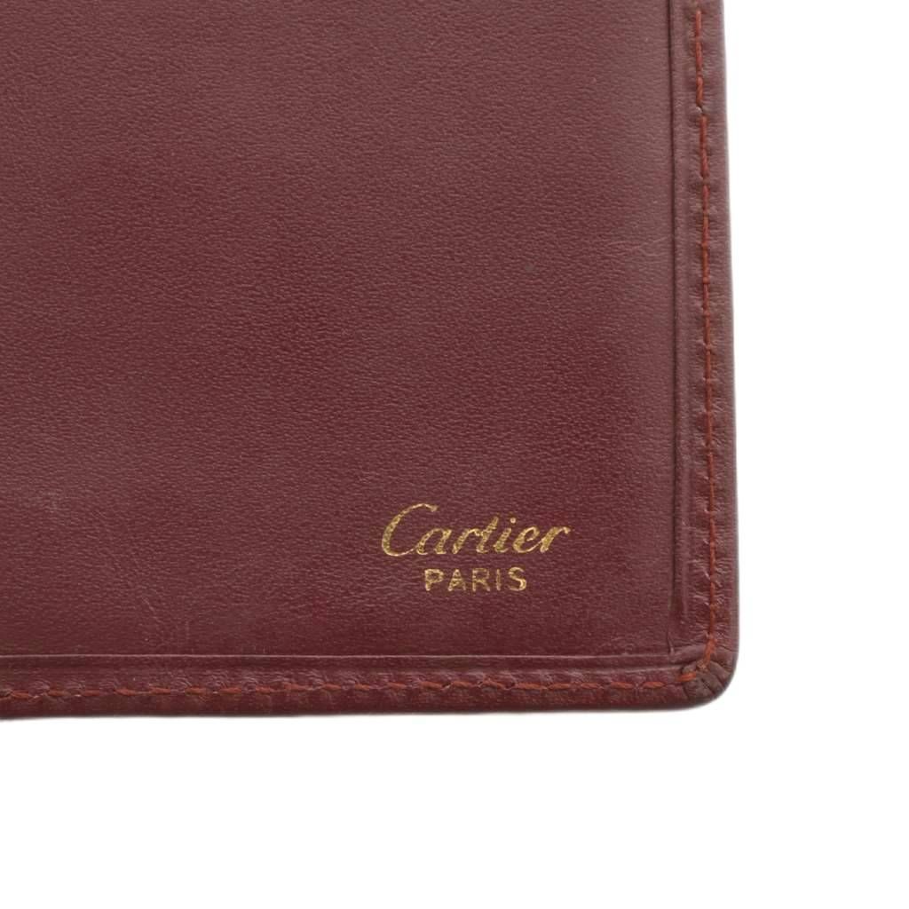 【未使用品】カルティエ 二つ折り財布 ボルドー 男女兼用 カルティエ Cartier マストライン ドゥーブルC 長財布 お札入れ 二