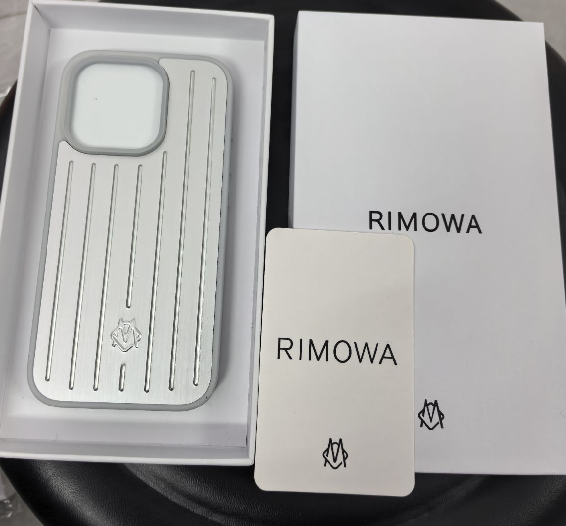 新品//未使用 RIMOWA iPhone12ケース シルバー・グレー黒 11ケース スマホ・タブレット・パソコン 新品-未使用 RIMOWA iPhone12