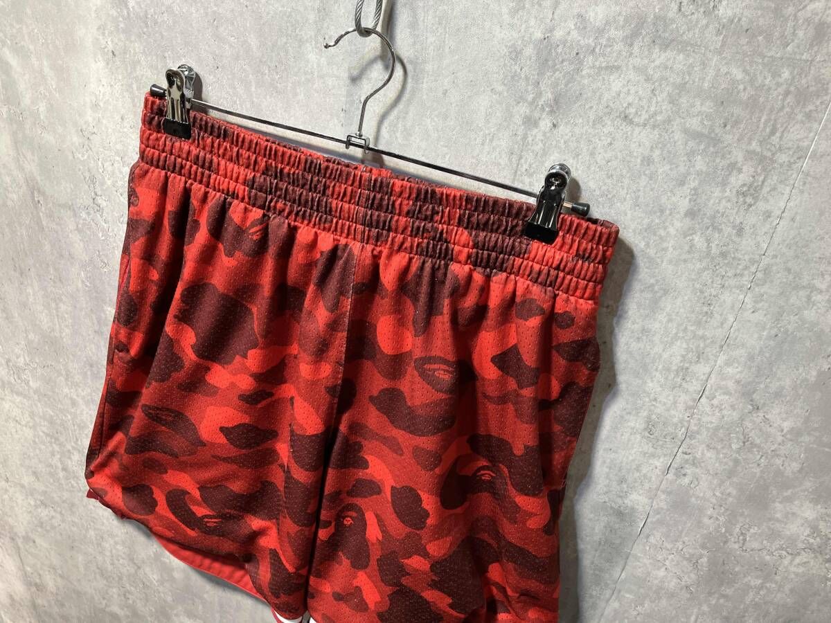 A BATHING APE カモワイドショートパンツ サイズL レッド アベイシングエイプ その他 パンツ メンズ