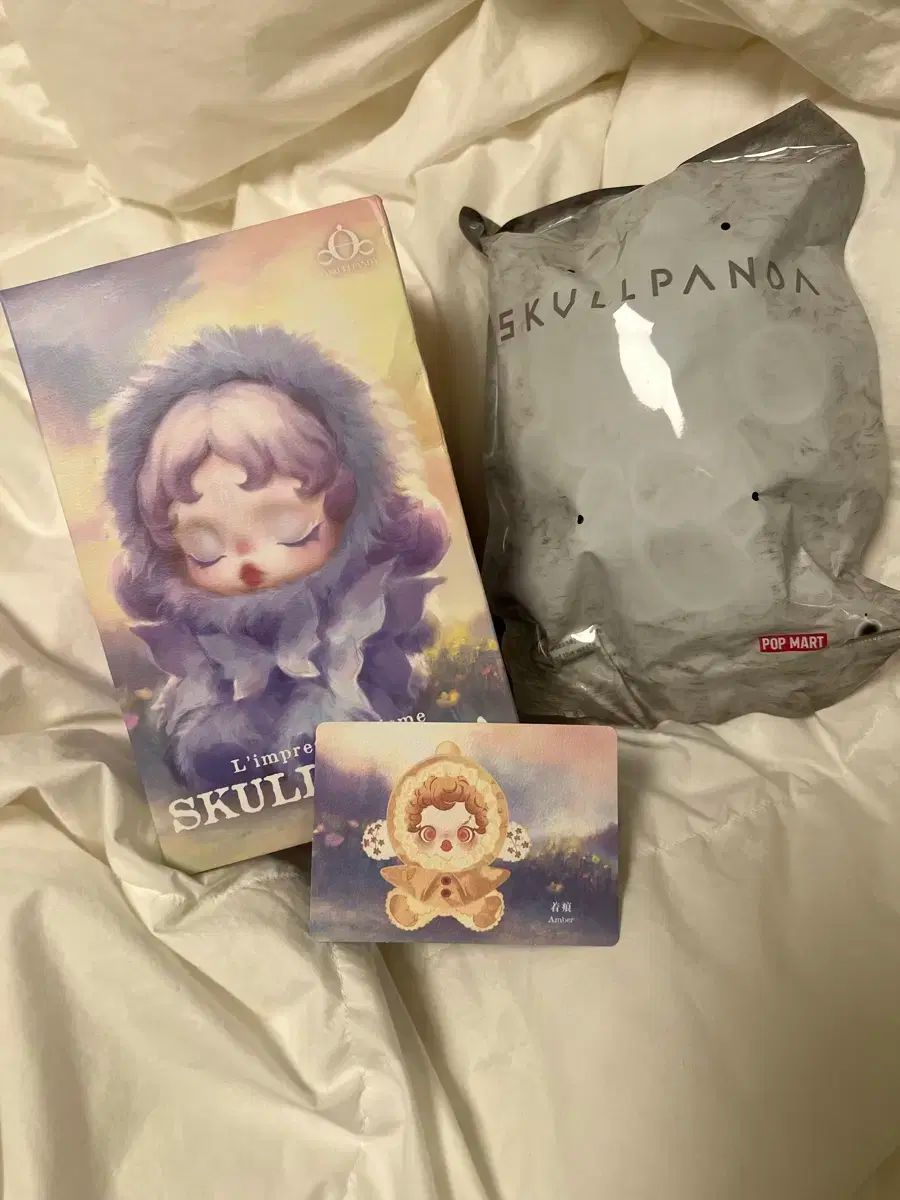 ポップマート スカルパンダ 光のジョンウォン アンバー キーホルダー