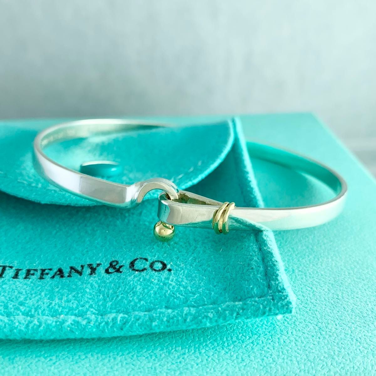 ティファニー フック&アイ バングル ゴールド コンビ ブレスレット WG1